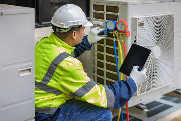 Professional Hvac technician working in Chartley, MA